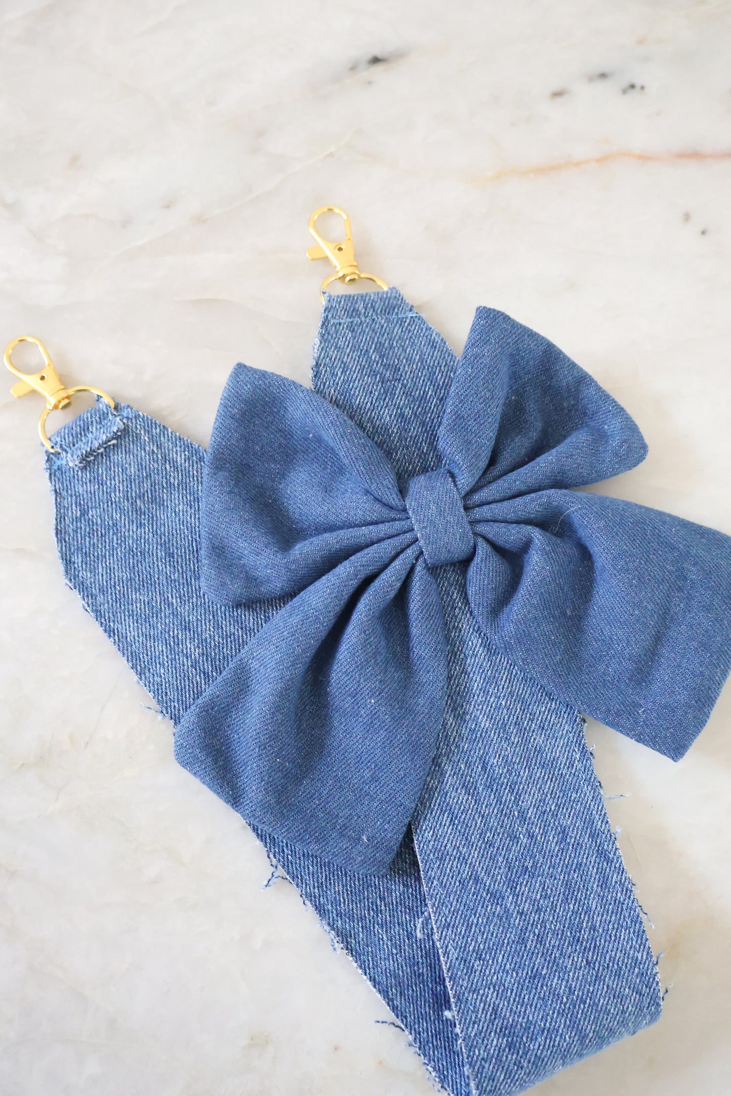 Phonecord denim bow